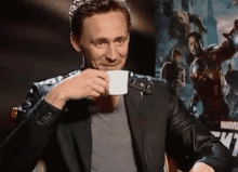 Tom Hiddleston Sips Drink GIF