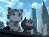 a cartoon cat and a batman are standing next to each other in front of a city skyline