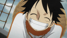a smiling anime character with a straw hat on