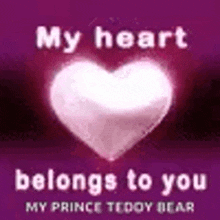 a pink heart with the words `` my heart belongs to you '' on it .