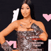 a woman stands on a red carpet with a sign that says " your rating punch send this "