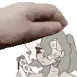 a hand is putting a bandage on a cartoon girl 's head .