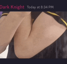 a picture of a person 's arm with the words dark knight today at 8:34 pm below it