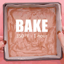 a person is holding a pan that says bake 350 degrees