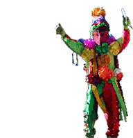 a man in a colorful costume is holding a wand