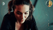 a close up of a woman with a ponytail