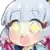 a close up of a cartoon character 's face with yellow eyes and a pink bow .