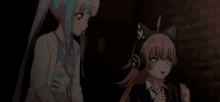 a couple of anime girls standing next to each other