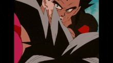 a close up of a man 's face with a red eye
