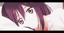 a girl with purple hair is laying on a bed .