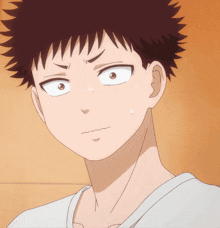 a close up of a person 's face with a surprised look on their face