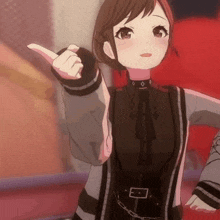 a girl in a black and grey outfit is pointing