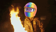 a person wearing a helmet with a smiley face on it