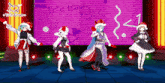 four anime girls are dancing in front of a screen that says trick trap on it