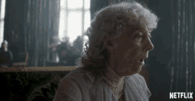 a woman with a surprised look on her face is featured on a netflix ad