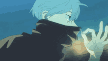 a person with blue hair is holding something in their hand