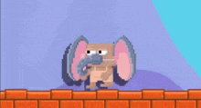 an elephant is standing on top of a brick wall in a video game .