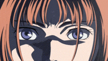 a close up of a woman 's face with a shadow on her face