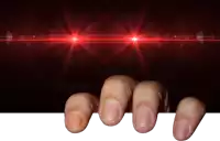 a close up of a person 's hand holding a white board with red lights behind it