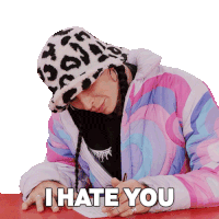 a woman wearing a leopard print hat and a jacket says i hate you