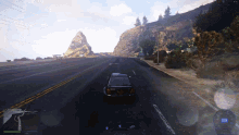 a video game shows a police car driving down a highway
