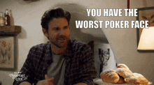 a man giving a thumbs up with the words you have the worst poker face