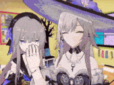 two anime girls are standing next to each other and one has a key on her chest