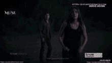 a man and a woman are running in the dark in a movie called muse .