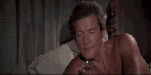 Baffled Roger Moore GIF - Baffled Roger Moore James Bond GIFs