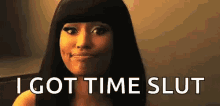 a woman with long black hair is making a face and saying `` i got time slut '' .