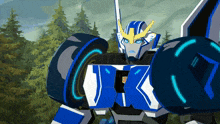 a blue and white robot with the letter j on it