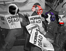 a group of soldiers are reading a newspaper titled horns dead