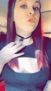 a woman wearing a choker and a nose ring