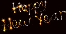 the words happy new year are written with sparklers on a black background