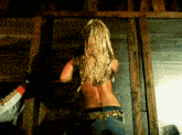 Girl-standing-against-wall Blonde-haired-girl GIF - Girl-standing-against-wall Blonde-haired-girl Girl-looking-back GIFs