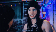 a man with long hair and a hat says " squeals a girl "