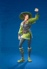 a person wearing a green hat and a green jacket is standing with their arms outstretched against a blue background .
