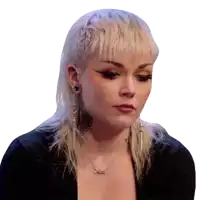 a woman with blonde hair and a necklace that says ' ariel '
