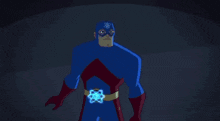 a man in a superhero costume is holding a glowing object in his hands