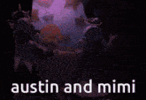 austin and mimi are standing in front of a purple background