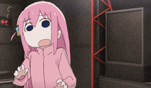 a cartoon girl with pink hair is standing in a room