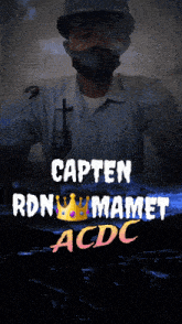 a man wearing a mask and a hard hat with the words capten rdn mamet acdc