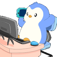 a blue and white penguin is sitting in front of a computer screen