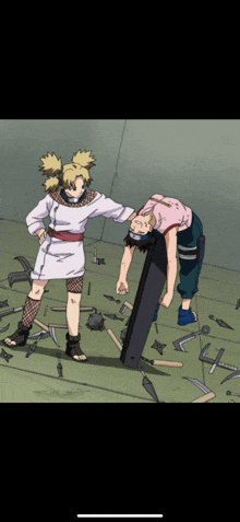 a couple of anime characters standing next to each other with a man laying on the ground