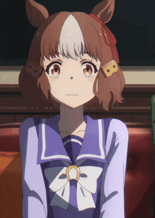 a close up of a girl with a horse 's head on her head