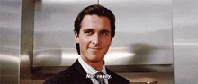 a man in a suit and tie is saying `` not really '' .