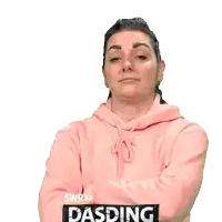 a woman is wearing a pink hoodie that says dasding