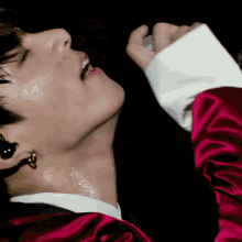 a close up of a person 's face with a microphone