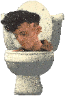 a young man is sitting in a toilet with his head sticking out of it