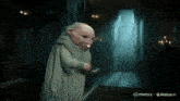 a cartoon character in a dark hallway is sponsored by minimux